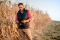 Farmer using tablet in everyday life. autumn harvest with farmer