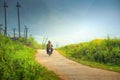 Farmer in Vietnam Drive a motorcycle to go to working