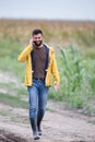 Farmer walking on farmland Royalty Free Stock Photo