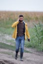 Farmer walking on farmland Royalty Free Stock Photo