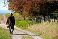 Farmer walking on his farm