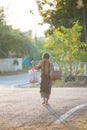 Farmer walking home after the harvest is completed