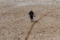 Farmer walking among the soil dries out due to a prolonged droug Royalty Free Stock Photo