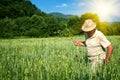 Farmer in the wheat field Royalty Free Stock Photo