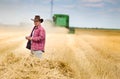 Farmer in wheat field Royalty Free Stock Photo