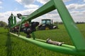 Farmer wheat field spraying herbicides. U Royalty Free Stock Photo