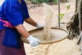 Farmer winnowing rice. Royalty Free Stock Photo