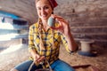 Farmer woman showing egg in a henhouse Royalty Free Stock Photo