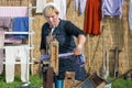 Farmer woman shows the use of a traditional washhub during a Dutch agricultural festiva Royalty Free Stock Photo