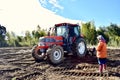 Farmer working in farm with reaping machine in Japan Kagoshima Sakurajima Royalty Free Stock Photo