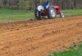 Farmer Plowing Field