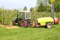 Farmer is working in the agricultural fruit orchards, Tricht / Betuwe, netherlands