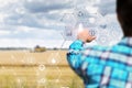 Farmer works on a virtual computer screen