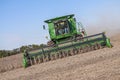 Farmers combining soybeans in fall harvest Royalty Free Stock Photo