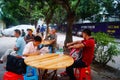 Farmers construction workers in the open air Restaurant