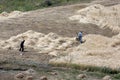 Farmers cutting hay near the site of Noah's Ark near the city of Dogubayazit in the far east of Turkey. Royalty Free Stock Photo