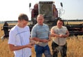 Farmers discuss the quality of millet Royalty Free Stock Photo