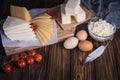 Farmers food products: milk, cream, cheese, eggs, cottage, butter. Rustic composition. Organic food concept
