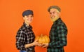 Farmers market. Autumn mood. Couple in love checkered rustic outfit hold pumpkin. Autumn routines. Farmer family concept Royalty Free Stock Photo