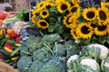 Farmers market in France with vegetables and sunflowers. Royalty Free Stock Photo