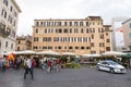 Farmers market on Market at Piazza Campo de`Fiori and building of flats