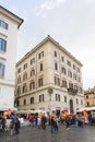 Farmers market on Market at Piazza Campo de`Fiori and building of flats