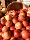 A bushel of fresh red apples at a market, a physical retail marketplace intended to sell foods directly by farmers to consumers. Royalty Free Stock Photo