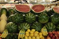 Farmers` market with vegetables and fruits, open shelves of Open showcases , counter, watermelon melons, avocados Royalty Free Stock Photo