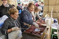 Farmers roasting Txistorra in Santo Tomas Fair. San Sebastian, Spain