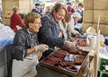 Farmers roasting Txistorra in Santo Tomas Fair. San Sebastian, Spain