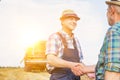 Farmers shaking hands in farm Royalty Free Stock Photo