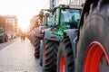 Farmers union protest strike against government Policy in Germany Europe. Tractors vehicles blocks city road traffic