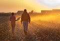 Farmers walking on field during baling Royalty Free Stock Photo