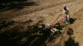 Farmers work the land using tractors areas Paranggupito Indonesi