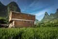 Farmhouse and Mountains