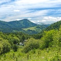 A farmhouse seen behind greenery in Altai Mountains, Kazakhstan