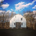 Farmhouse under a blue sky
