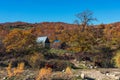 Farmhouse and yard in the fall season Royalty Free Stock Photo