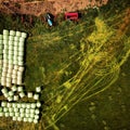 Farming bailing and tractor tracks Arial shot ,view from above looking down Royalty Free Stock Photo