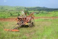 farming equipment and colored cart Royalty Free Stock Photo