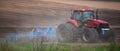 Farming Flourish: Tractor Cultivating with Expertise