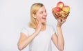 Farming green life. healthy food. Happy woman eating apple. orchard, gardener girl with apple basket. autumn harvest Royalty Free Stock Photo