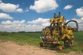 Farming machine in field