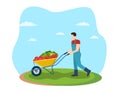 Farming man pushing wheelbarrow