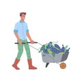 Farming man with wheelbarrow of eggplants