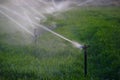 Farming Sprinklers in Field Irrigation and Watering of Crops Royalty Free Stock Photo