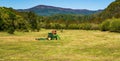 A Farming Tractor in a Field