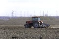 Farming, Tractor with Plough, Plowing in a Field Royalty Free Stock Photo