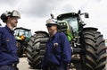 Farming tractors with two mechanics Royalty Free Stock Photo