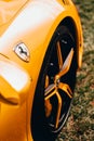 Ferrari Yellow Race Car side mirror view Royalty Free Stock Photo